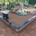 Cemetery with cross and flowers