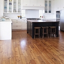 Waxing of wooden floorboards