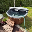 Hot tub with integrated oven and granite top made in Latvia