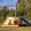 Tub with external oven