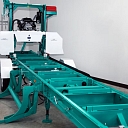 Multifunctional sawing machine for precise wood processing