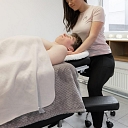 Relaxing massage, which helps reduce stress and improves body well-being.