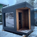 Wooden frame sauna with open anteroom