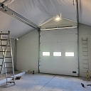 Lifting gates for hangars