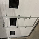 Lifting gate with personnel door