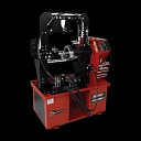 Wheel rim straightening machine