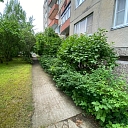 Trimming overgrown bushes and clearing paths with SwiftClean