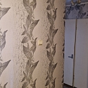 Wallpapering and wall decoration works.
