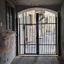 Hinged gates with metal pipe filling