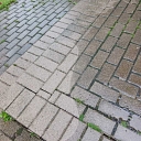 High-pressure washing of pavement