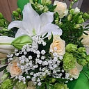 White and green flower bouquet with lilies