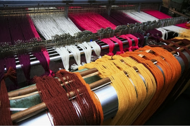 Production of woolen yarn