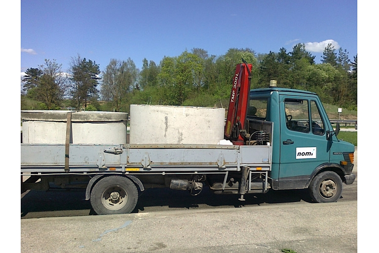 We transport sewage pipes, lids and rests