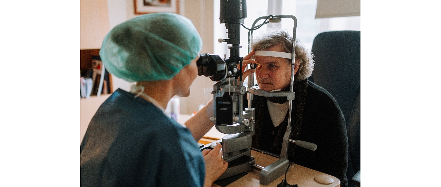 Eye examination with a biomicroscope, retinas, examination of eye structures