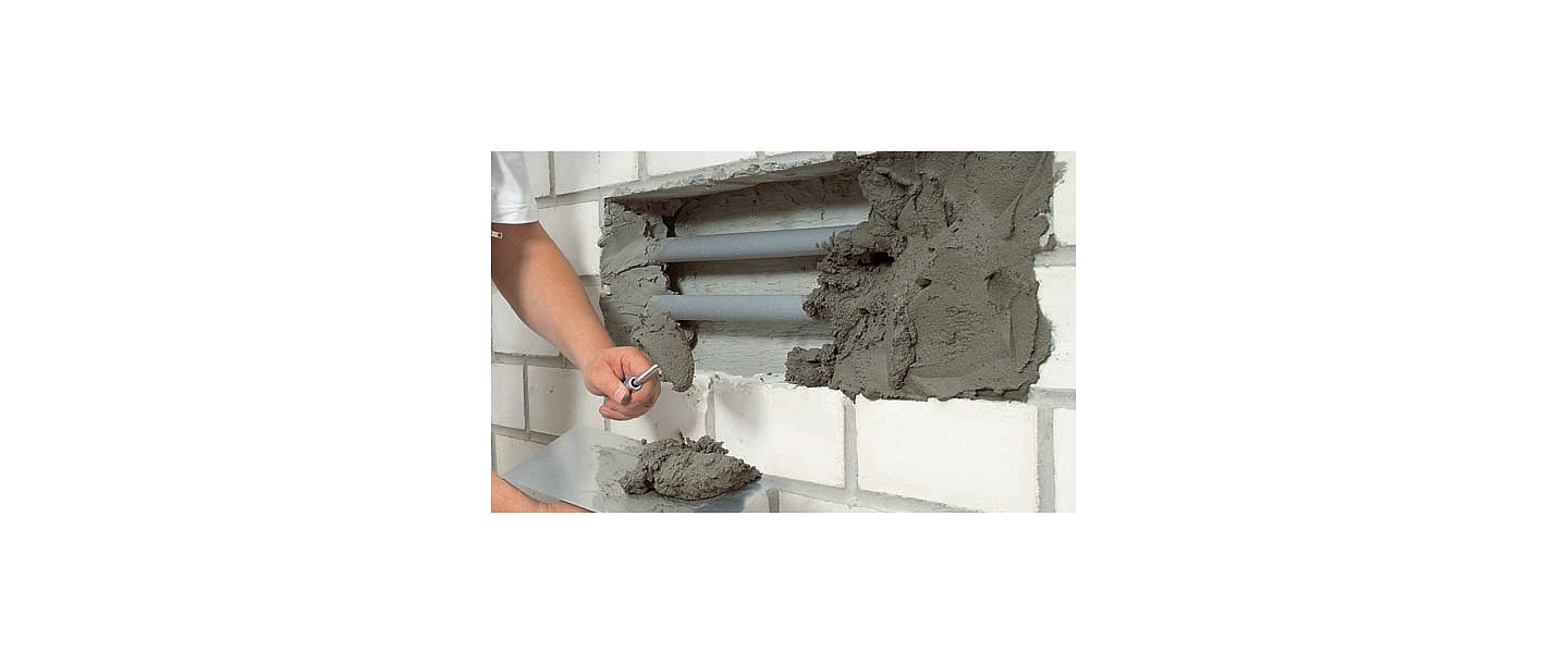 Putty and repair mortar for walls and facades
