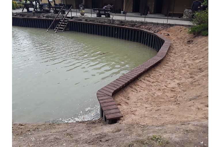 Excavation of water bodies and strengthening of the shoreline
