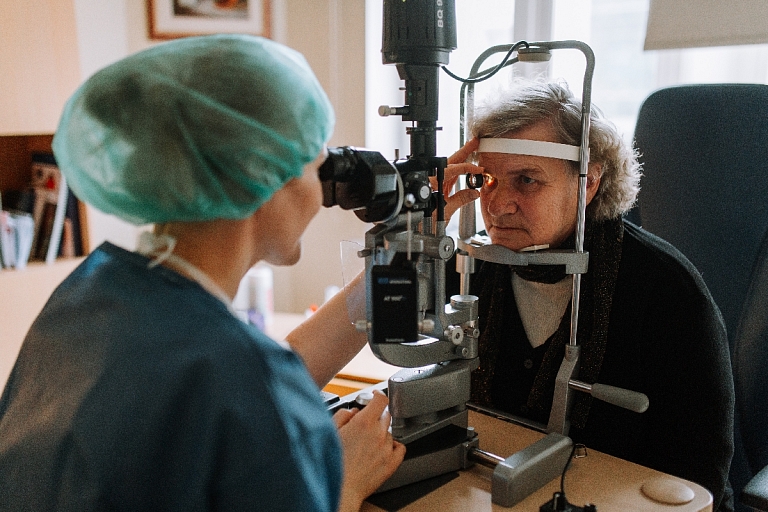 Eye examination with a biomicroscope, retinas, examination of eye structures