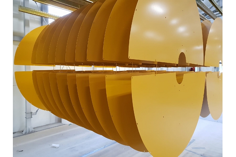 Powder coating of metal parts