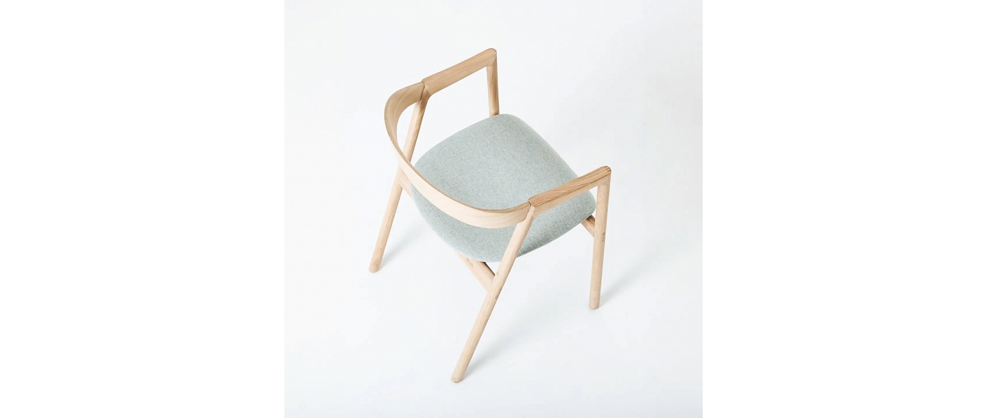 Premium design chair with ergonomic shape – comfortable upholstered furniture for the interior