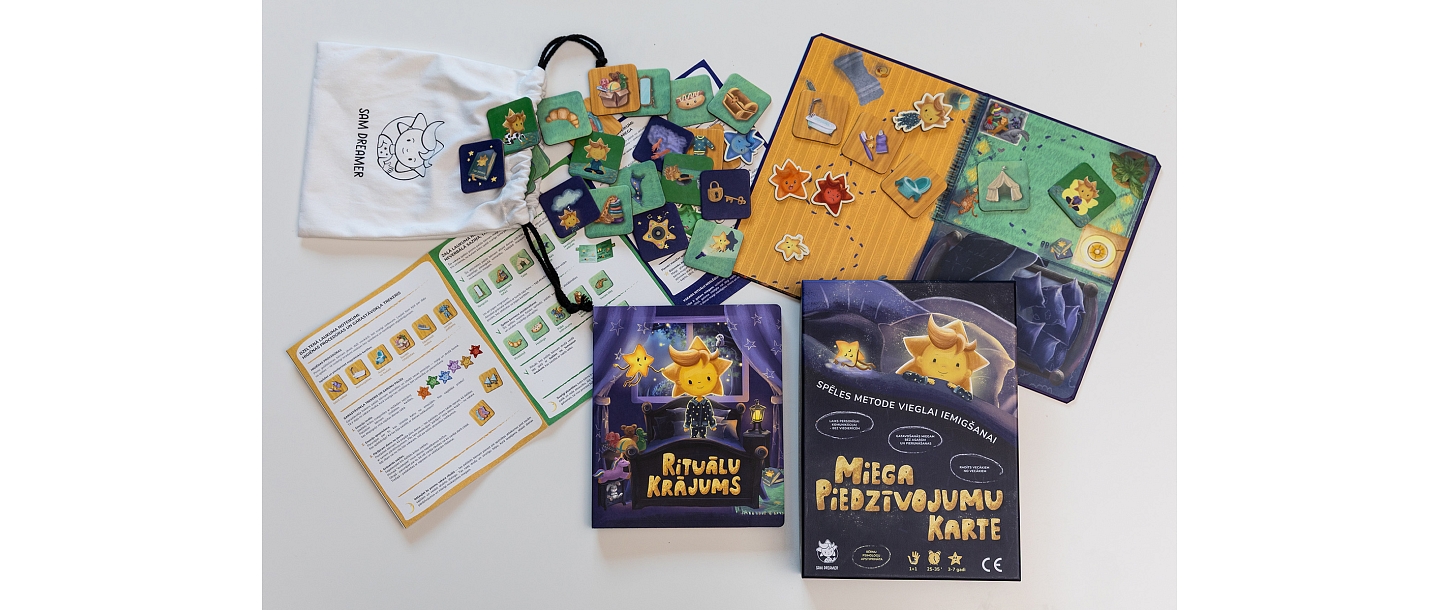 Sam Dreamer game components, including a book "Ritual Collection" and game board