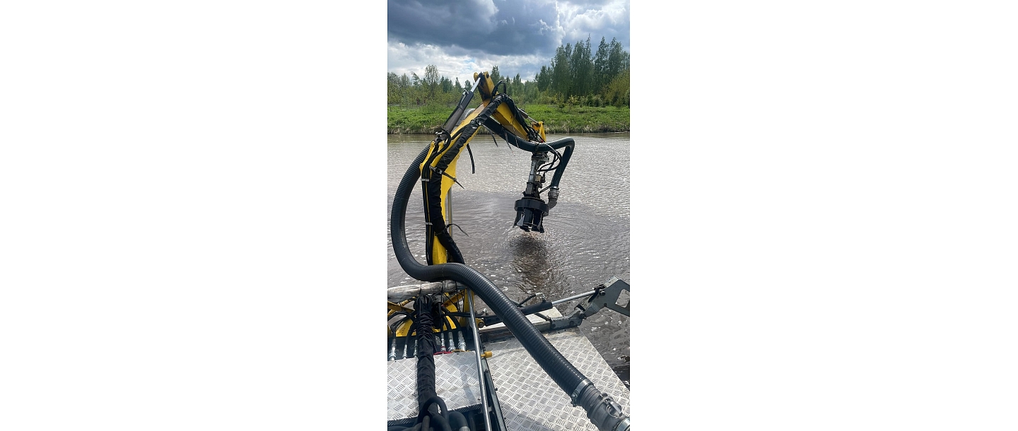 Cutting reeds and water grass