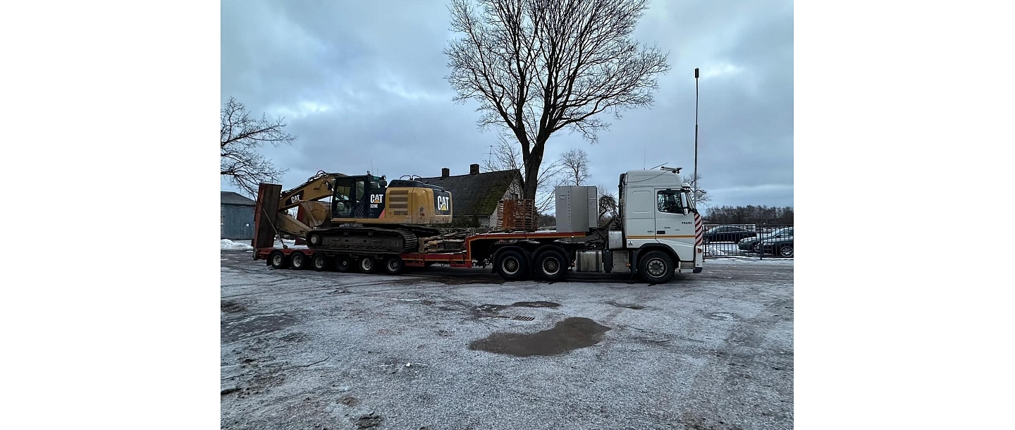 Delivery of road construction equipment