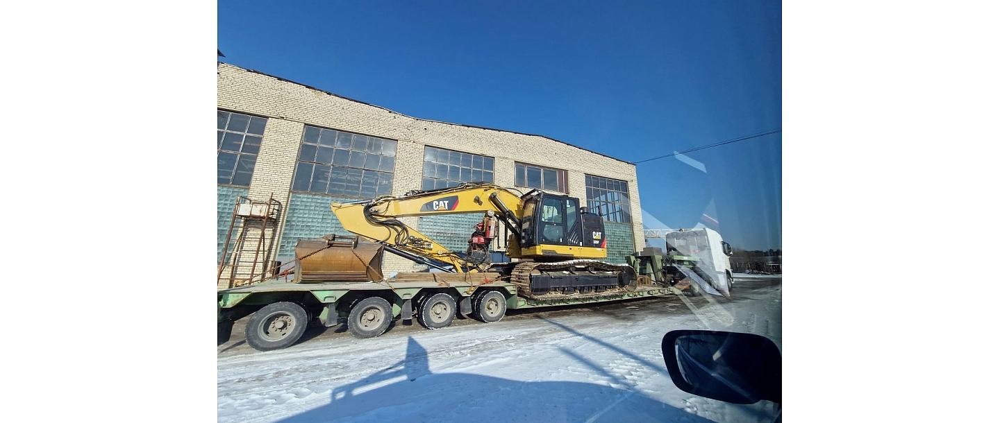 Road construction equipment transport