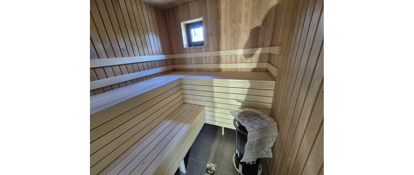 Wooden sauna construction and interior decoration