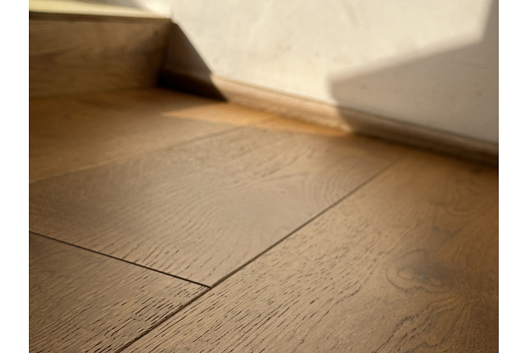 Rich and deep dark oak parquet adds luxury to your spaces