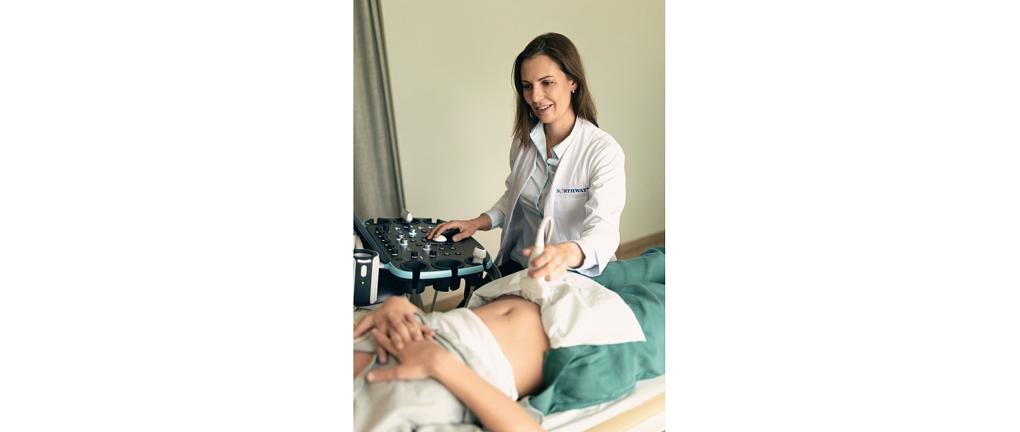 Gynecologist-reproducologist Dr. Nellija Seimuskina with a patient