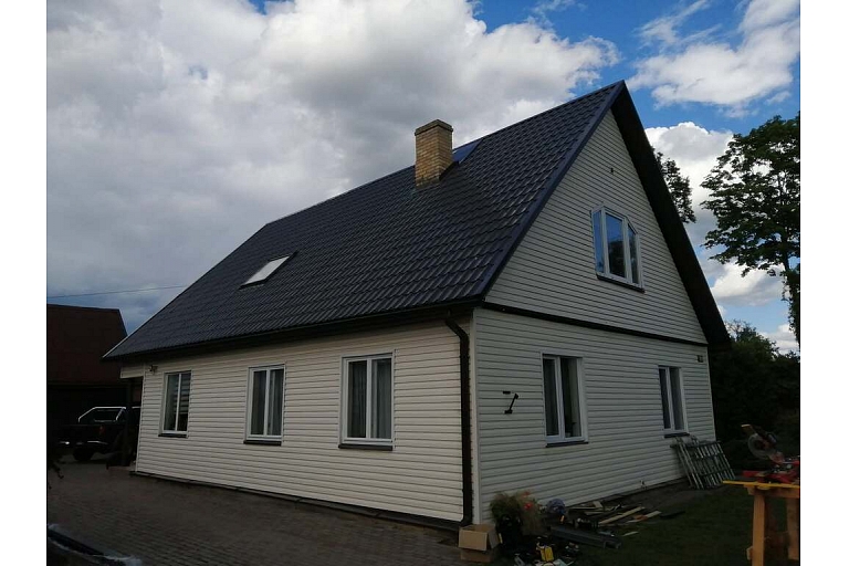 Metal roof covering