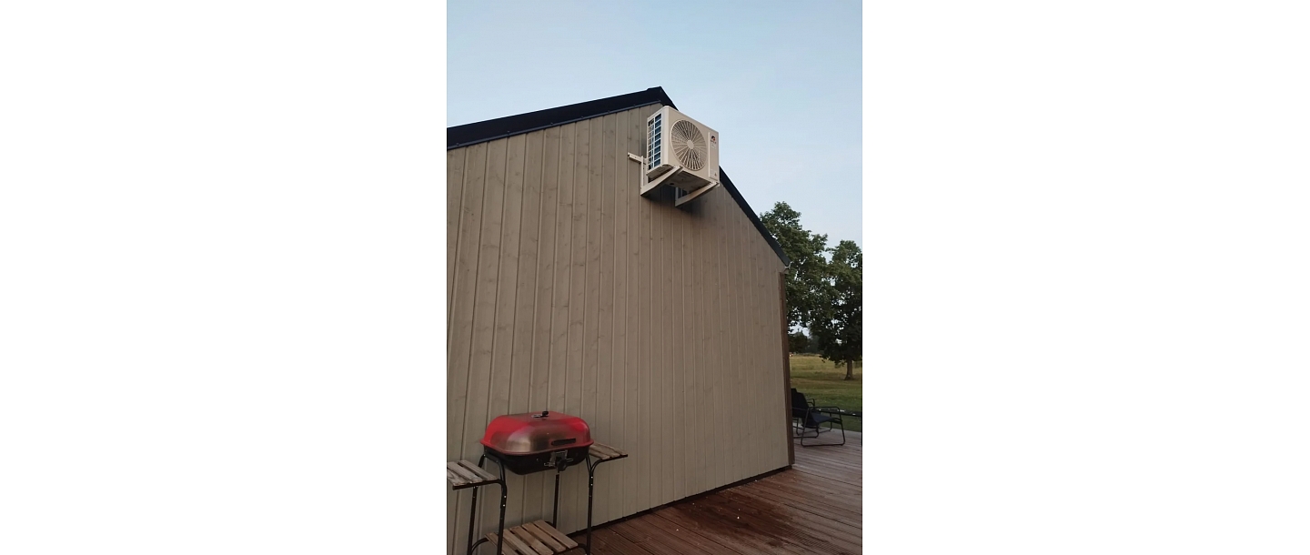 Mounting the outdoor air conditioner unit on the wall of the building
