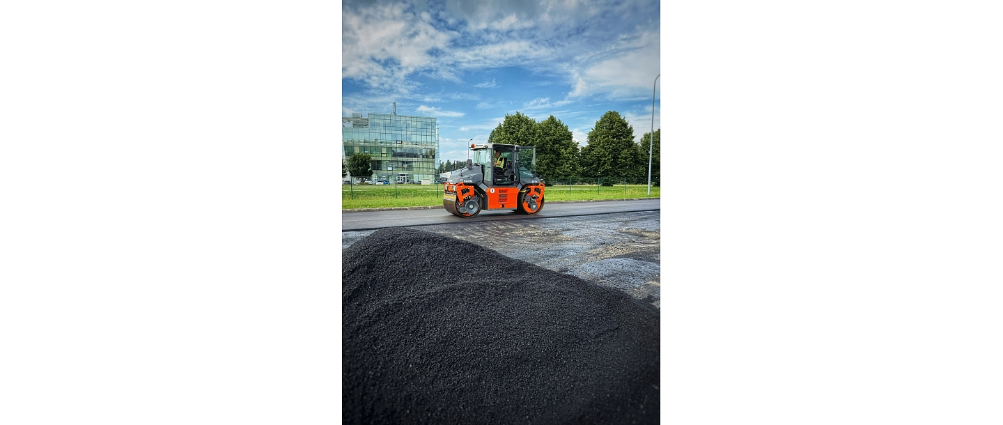 Resurfacing of asphalt in a parking lot