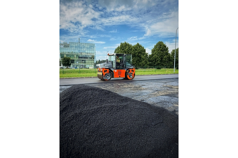 Resurfacing of asphalt in a parking lot