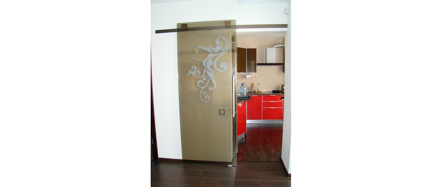 Glass sliding door with ornament
