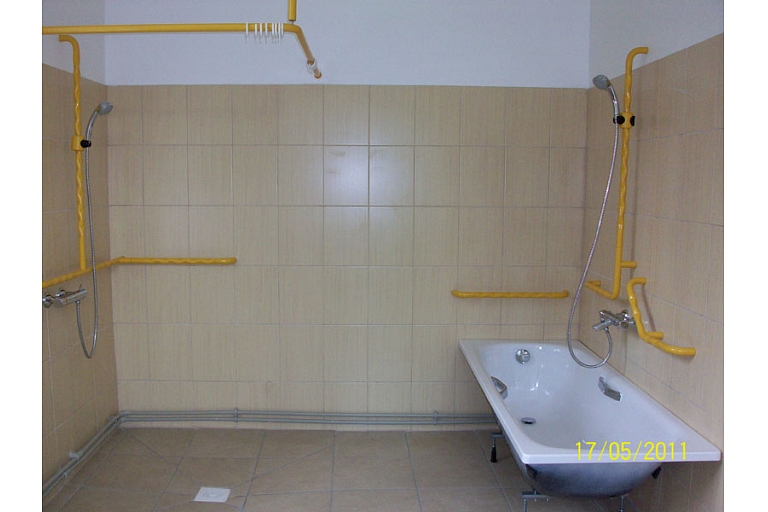 Water treatments for patients with mobility impairments