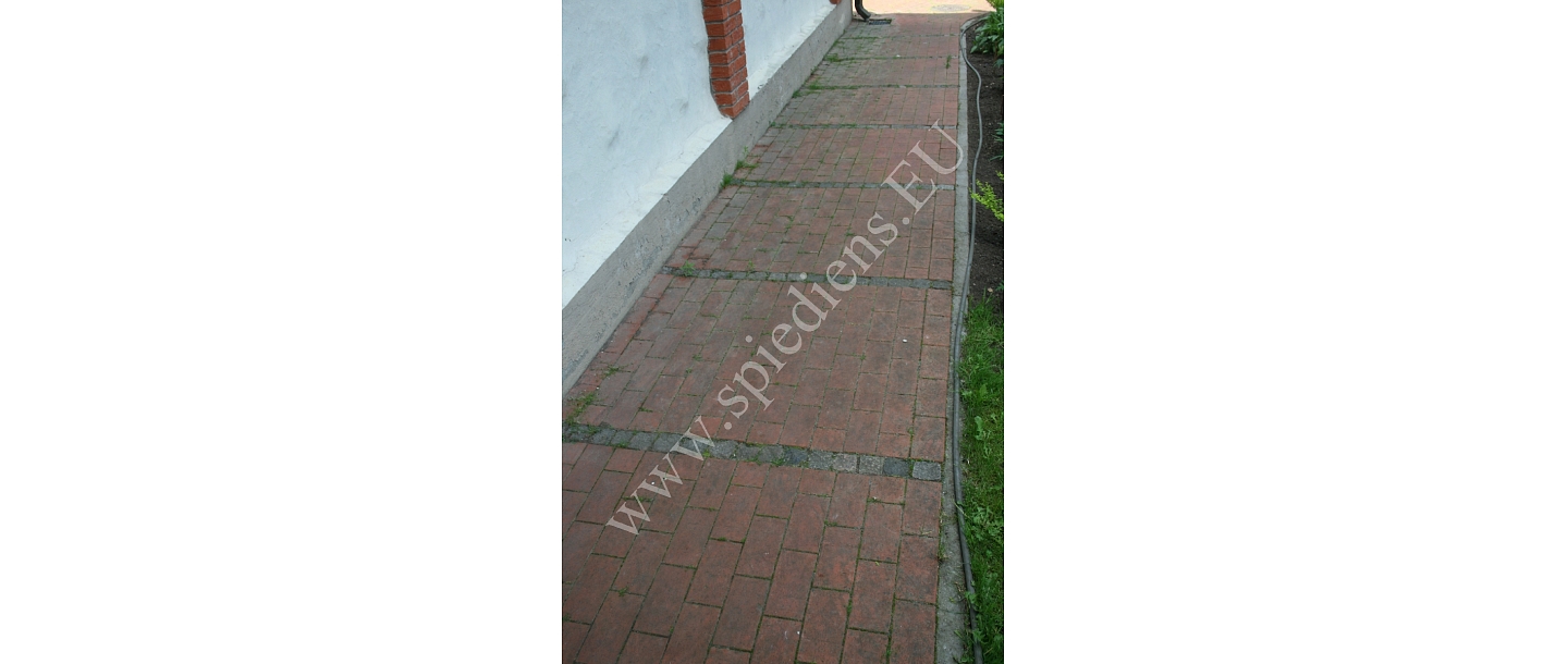 Dirty pavement.  "Pressure" provided by the pavement, asphalt, metal construction cleaning services