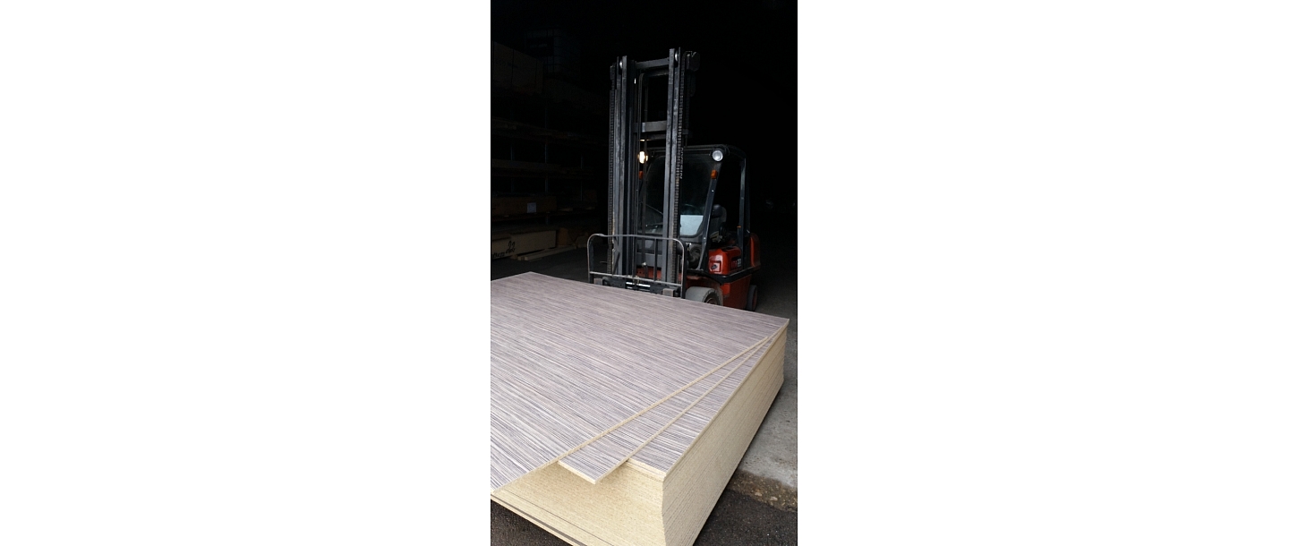 Varnished wood fiber boards