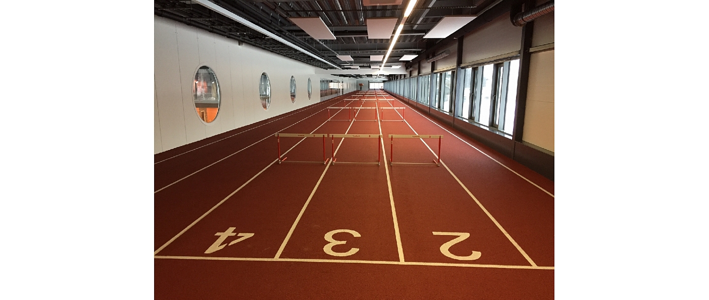 Rubber coverings for sports fields