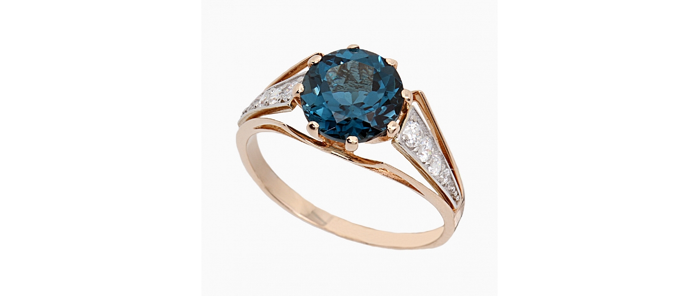 Gold ring with topaz