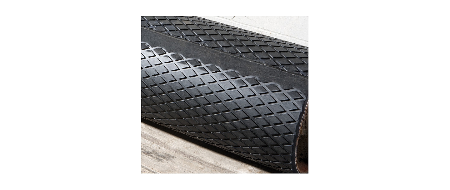 Roll covering with rubber
