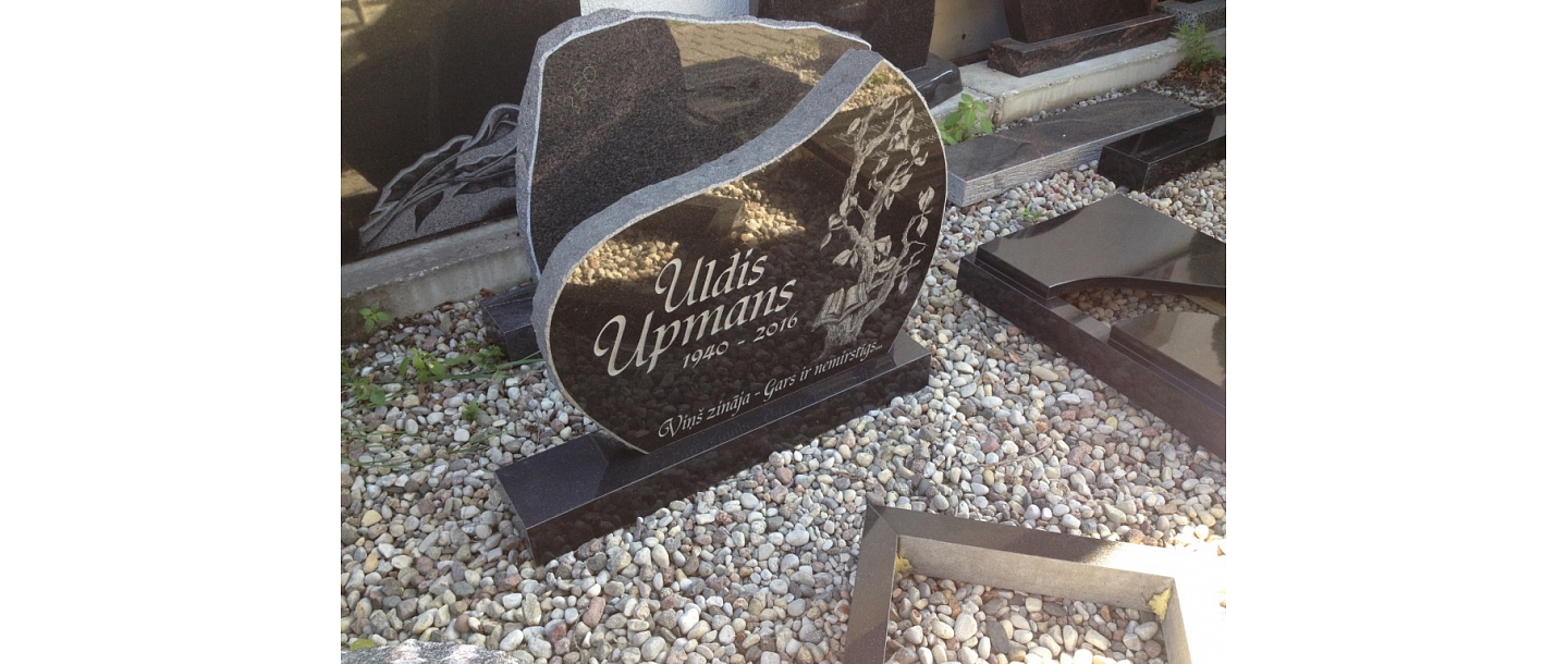 Original grave monument with engraving