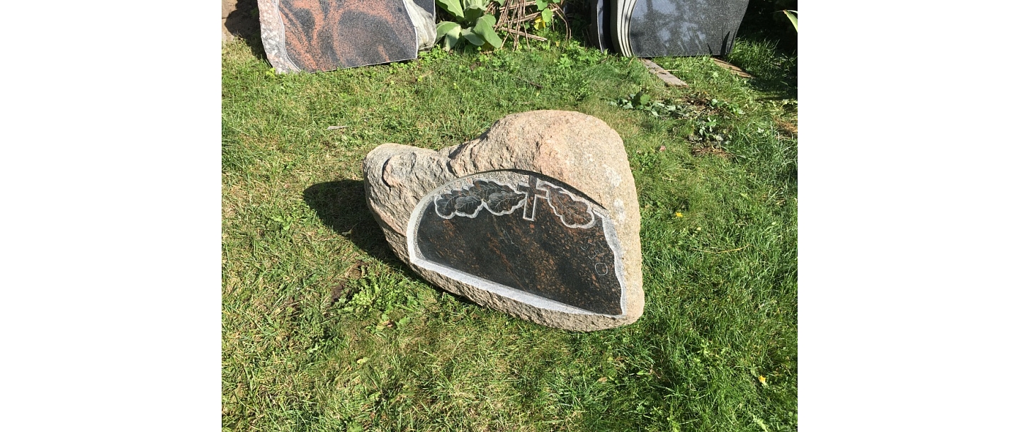 Original grave monument with engraving