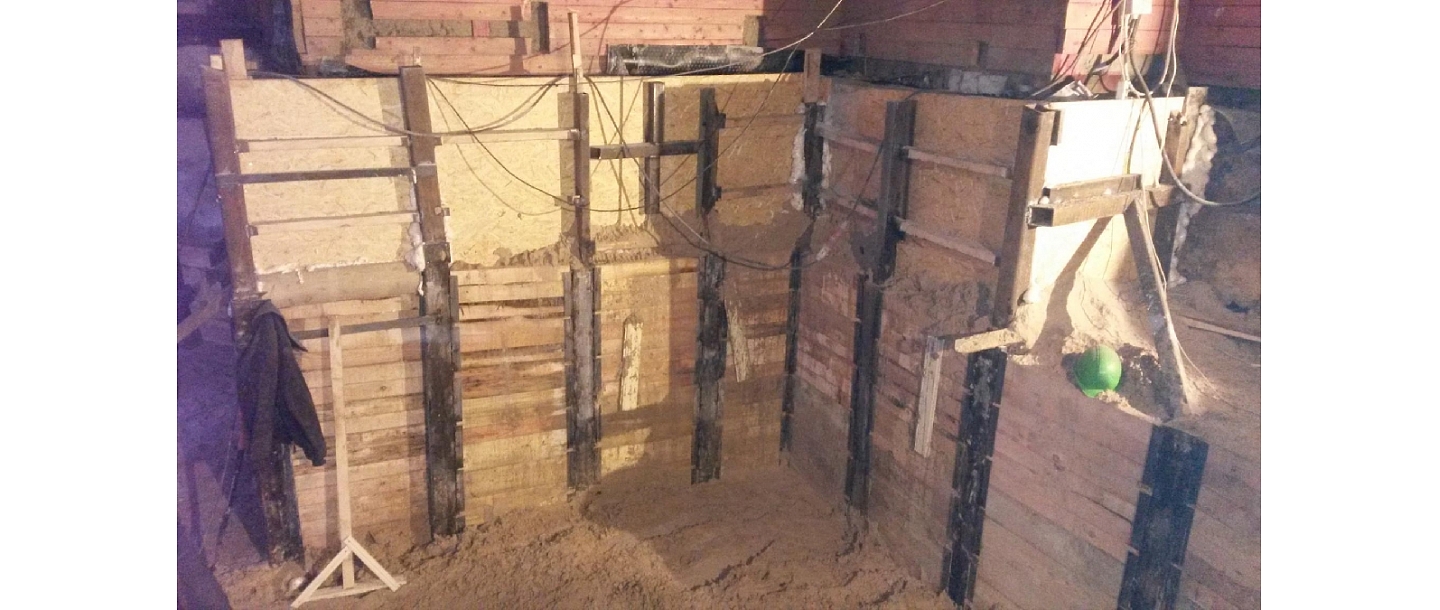 Construction of a basement building, supporting walls