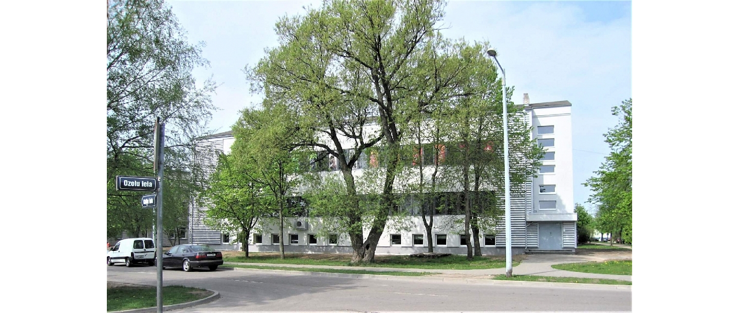 The main entrance of the white building