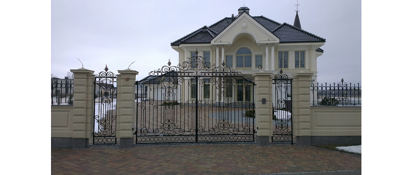 Forged baroque gate, fence and railing with gold patina in Marupe