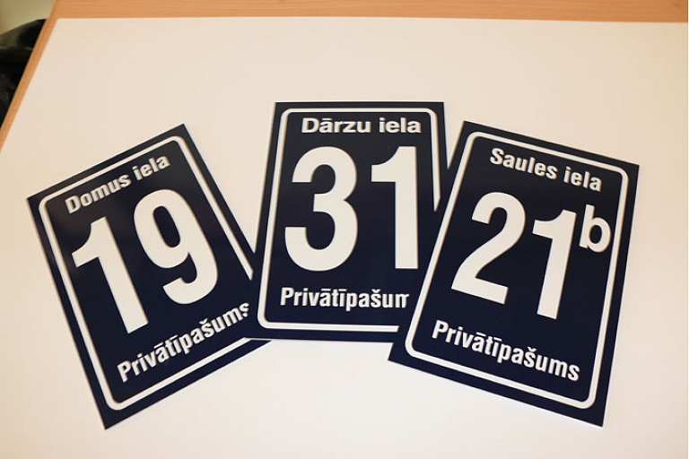 House numbers, street name plates