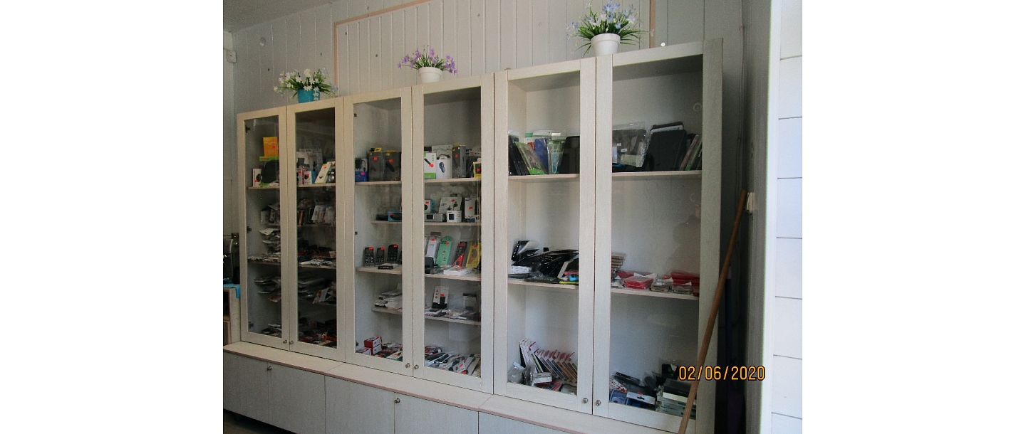 "Tip Top Phone", shop-workshop