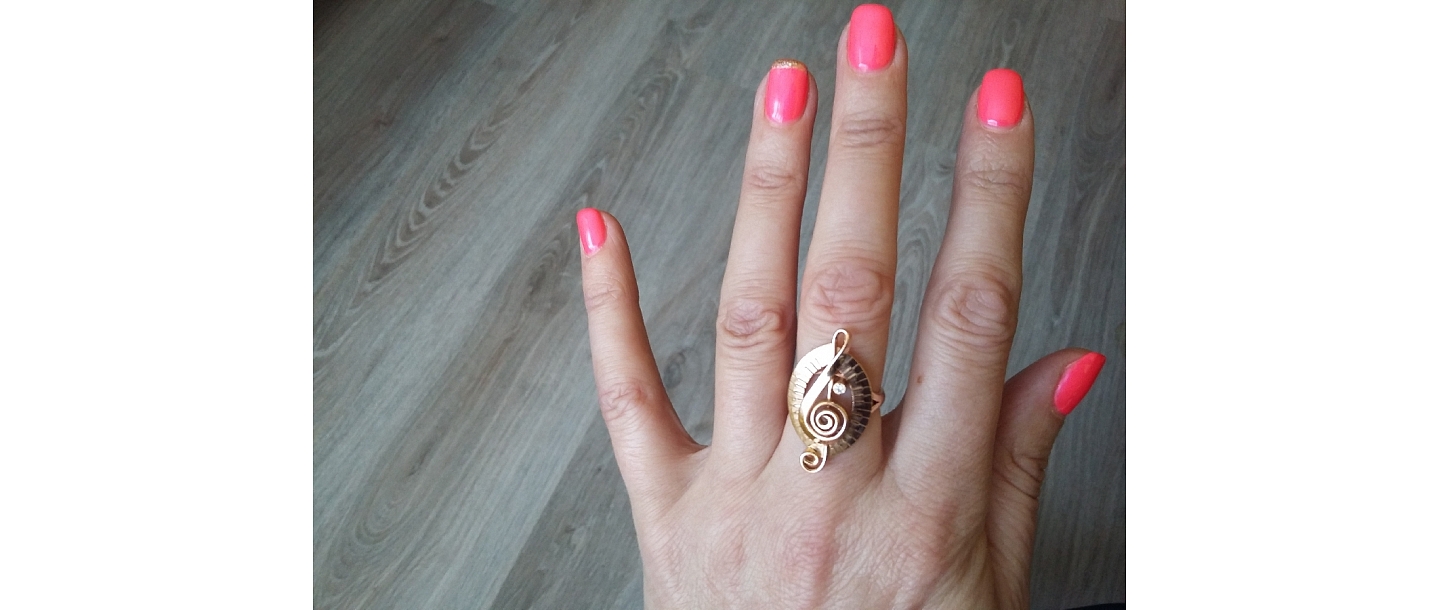 A ring with a clef symbol