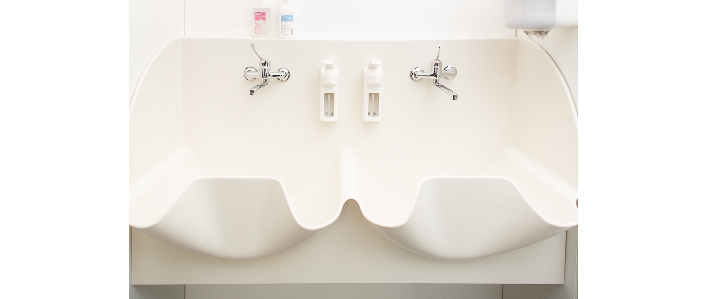Surgical sink with two stations made of Corian ® material